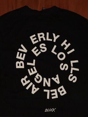 H&M Black Tee with Vertical White City Graphic